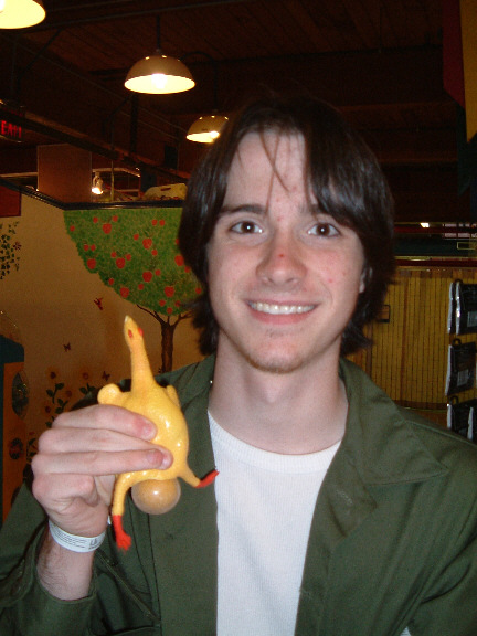 kaegan and the rubber chicken.jpg